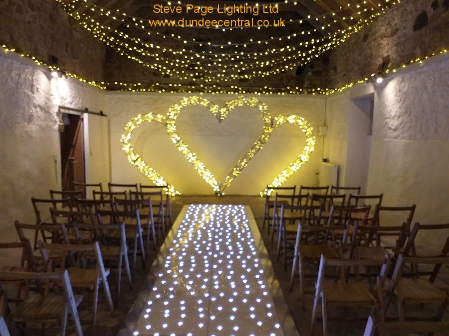 cow shed white barn ceremony lights